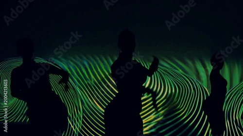  Loop of people silhouettes dancing with hypnotic motion, stripes in abstract style.