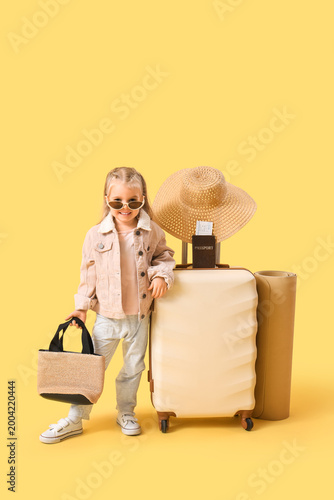 Cute little girl with sungl...