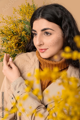 Beautiful young woman with ...