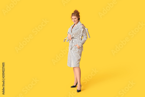 Beautiful young woman in st...