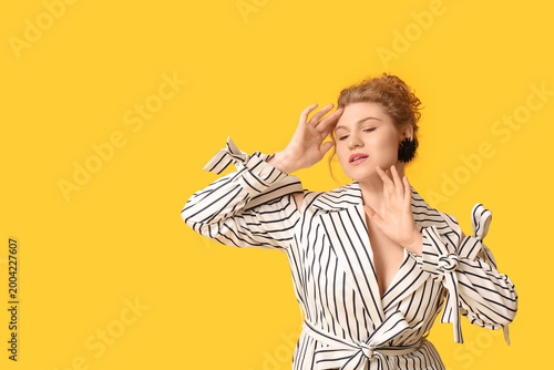 Beautiful young woman in st...