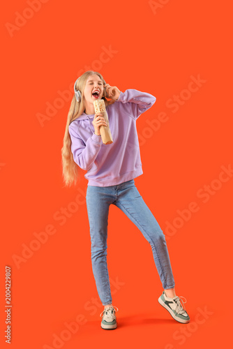 Young woman in headphones w...