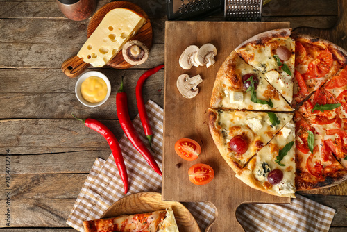 Boards with different pizza...