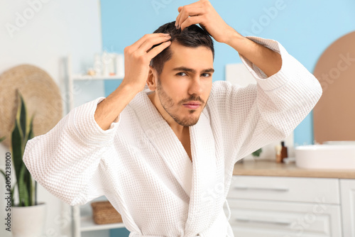 Young man with hair loss pr...
