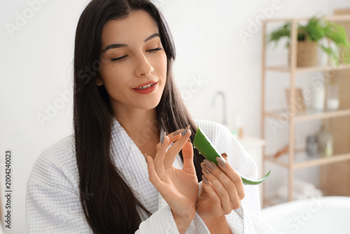 Beautiful young woman with ...
