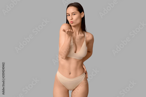 Beautiful young woman in li...