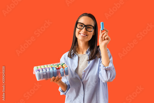 Female tailor in eyeglasses...