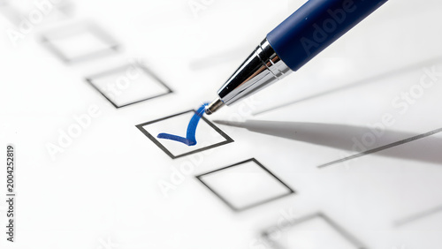 blue pen marking on checklist sheet