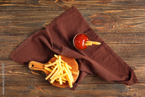 Board with tasty french fri...