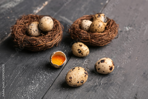 Fresh quail eggs on dark wo...