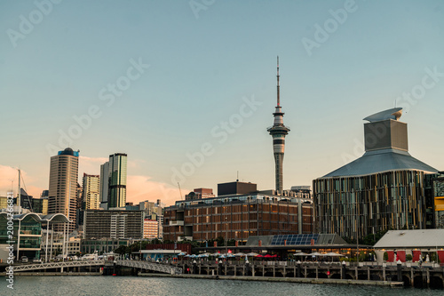 Auckland city by the harbour in the late afternoon with view to sky tower