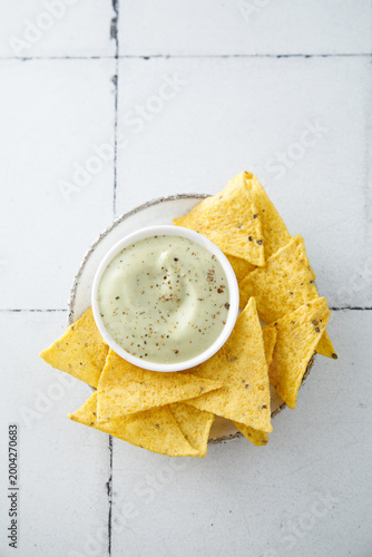 Yogurt avocado dip with nachos