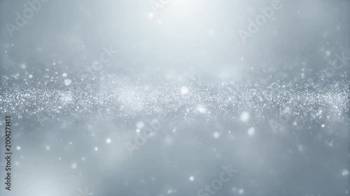 Abstract shimmering particles and bokeh lights on a soft, glowing background