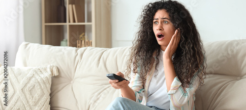 Shocked young African-Ameri...