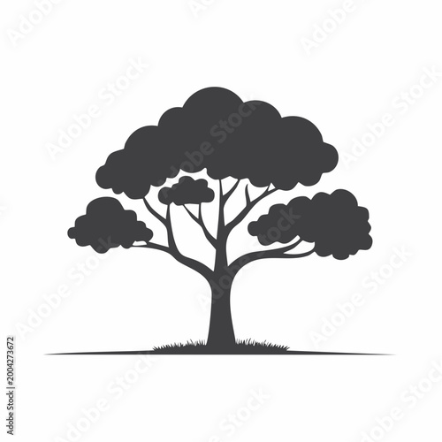 Silhouette of a stylized tree with fluffy clouds for foliage