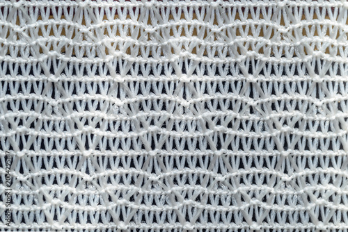 Fotografie Close-up macro of intricate white lace fabric with elegant geometric patterns