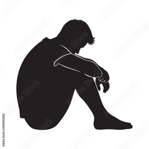 Silhouette of a man sitting with head down. Representing depression, loneliness, and mental health struggles, ideal for awareness campaigns