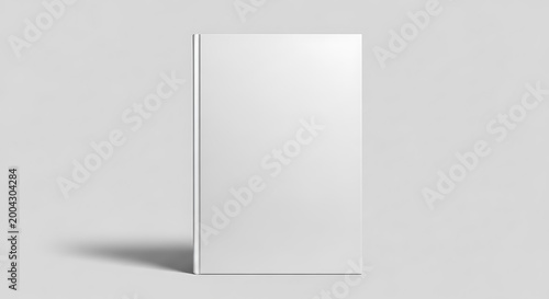 Blank white book cover mockup standing upright on a plain light gray background, front view angle
