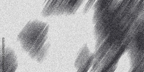 Dynamic abstract grayscale image with blurred streaks and a grainy texture, suggesting movement and energy for digital art and backgrounds