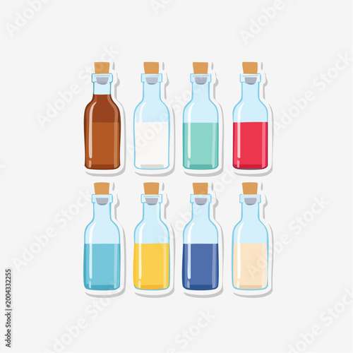 Collection of colorful liquid bottles with cork stoppers