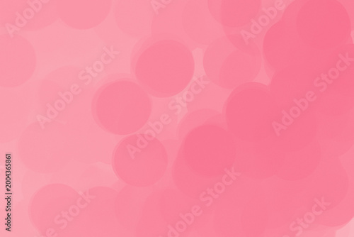 Soft pink abstract illustration with translucent bokeh shapes, smooth blurred texture