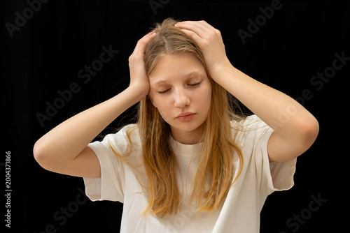 Εκτύπωση καμβά Upset Young Girl Holding Her Head