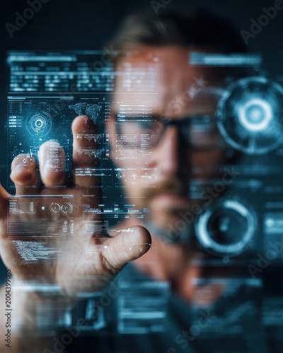 Digital Innovation: A focused individual interacts with a futuristic digital interface, seamlessly integrating technology and intellect.