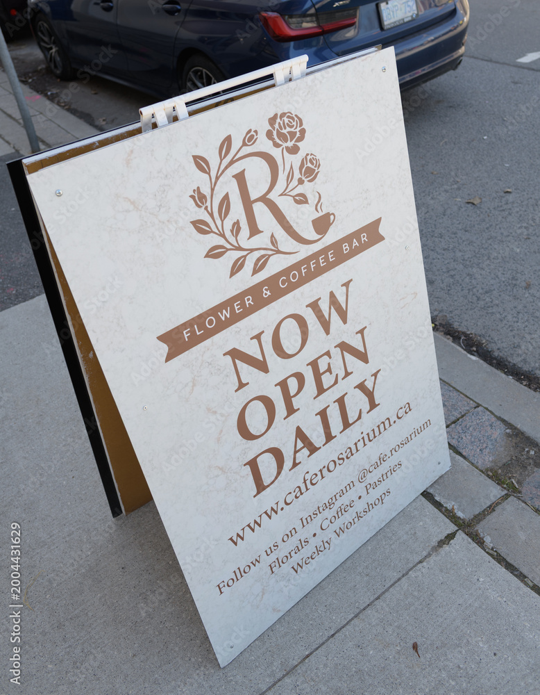 Fototapeta premium a-frame sidewalk signs for Café Rosarium, a cafe, located at 878 Yonge St, Toronto