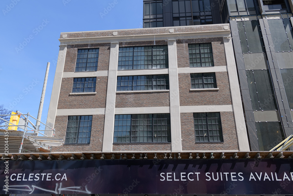 Fototapeta premium exterior of Celeste Condominiums located at 121 George Street (corner of Richmond St E) under construction, Toronto