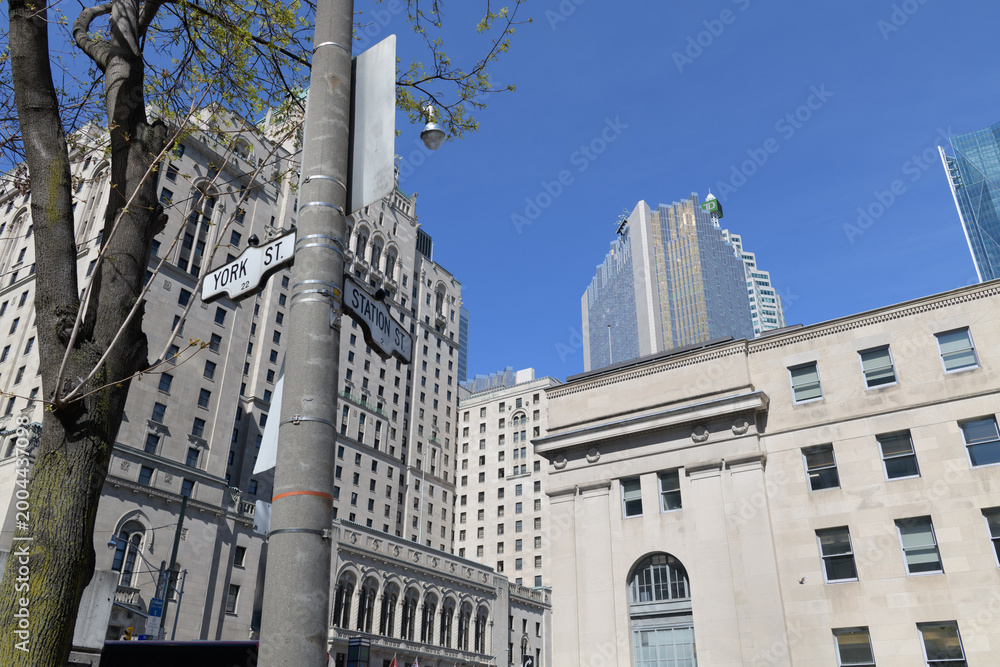 Obraz premium looking northeast from the corner of York St and Station St to Fairmont Royal York hotel, Royal Bank Plaza, and a section of Union Station, Toronto