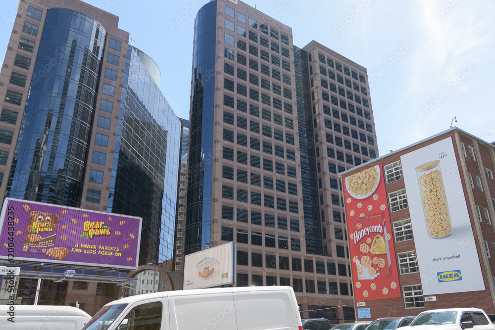 Naklejka premium roadside billboards at southwest corner of Church St and Bloor St E (behind: 175 Bloor Street East, an office complex), Toronto (Bear Paws, Honeycomb cereal, and IKEA)