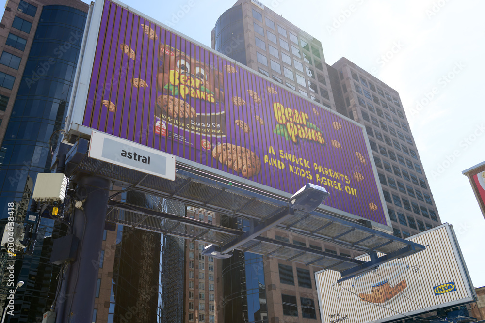 Fototapeta premium tri-vision slat billboard with advertising for Bear Paws and Ikea near Bloor St E and Church St, Toronto