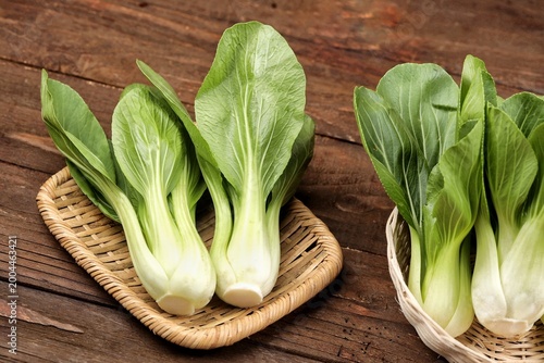 Fotografie Pak choi or bok choy or fresh Chinese cabbage with crisp green leaves and tender