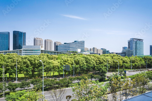Captivating Urban Landscape with Lush Greenery and Striking Skyscrapers