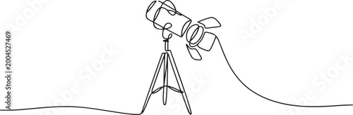 Minimalist one line drawing of a studio spotlight on a tripod with a flowing line, perfect for creative presentations, media industry branding. Single line art. Editable stroke