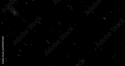 Slow Motion of Falling Realistic Snow, Dust or Rain Particles Captured on a Pure Black Background. Perfect as a VFX or Compositing Overlay for Winter Atmospheres, Transitions, and Visual Effects.