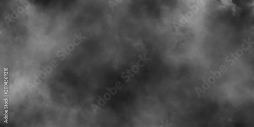 Tablou pe pânză Abstract white puffs of smoke swirls overlay on black fog background pollution, perfect for adding depth and digital and creative designs, empty space studio dark room with white spot lighting