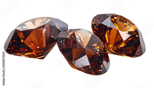 Three sparkling faceted gemstones with amber color against a black backdrop, reflecting light