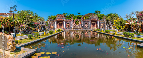 Obraz na płótnie A panorama view of a Temple Gate in the old town in Hoi An, Vietnam on a bright
