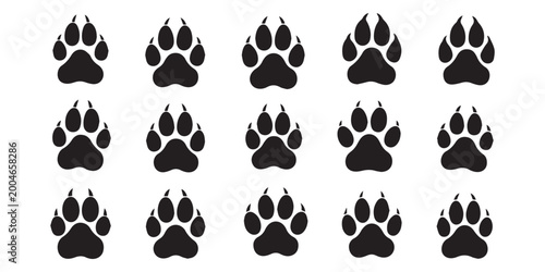 Tableau sur toile Different animal paw prints black silhouette vector set