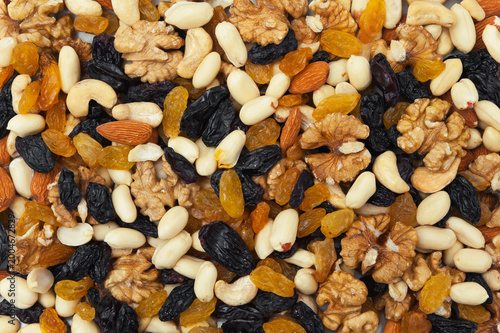 Mix of nuts and dried fruits. Background and texture with a top view.