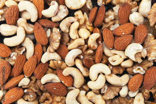 Mix of nuts and dried fruits. Background and texture with a top view.