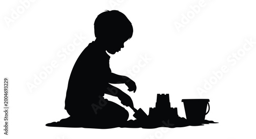 child playing with sandcastle toys black silhouette