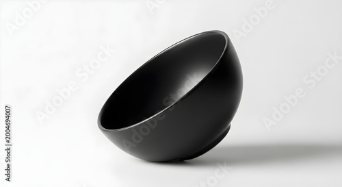 black bowl on white background, empty matte ceramic bowl