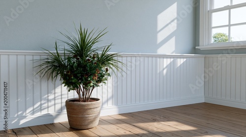 White beadboard wall featuring a classic chair rail trim and elegant vertical paneling, providing a traditional and clean interior design aesthetic.