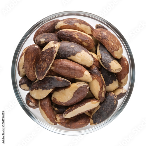 Top View of Raw Brazil Nuts in Bowl Isolated on White Background