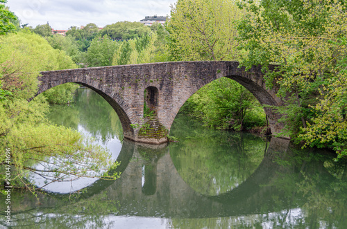 Vászonkép Puente de la Magdalena over Arga River, Pamplona, Spain