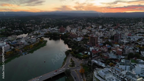Aerial view of villa carlos paz cityscape at sunset