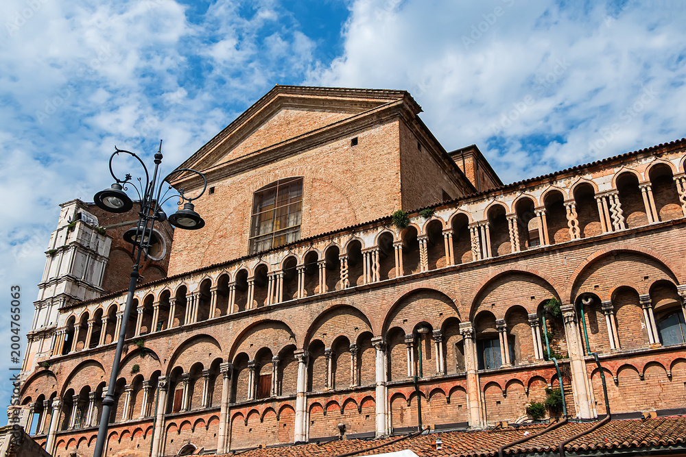 Fototapeta premium Architectural fragments of Saint George the Martyr Cathedral (Basilica Cattedrale di San Giorgio Martire) in Romanesque style was built in 1135. Ferrara, Emilia-Romagna, Italy.