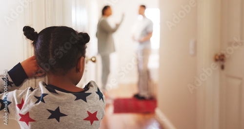 Foto Divorce, fight and back of child in family home for conflict, disagreement and custody battle